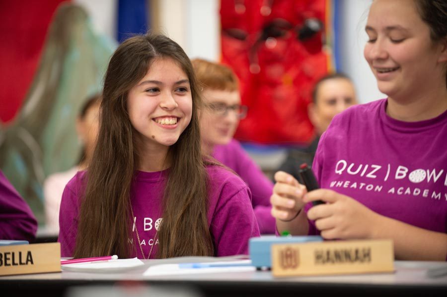 Bella competes in Quiz Bowl competitions